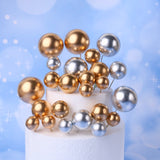Gold and Silver faux balls used on a dummy cake by thechocosupplies